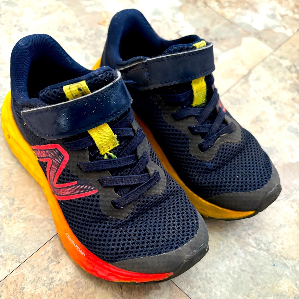 Practically new kids sized 10.5 new balance shoes! Kid grew two months in 😑